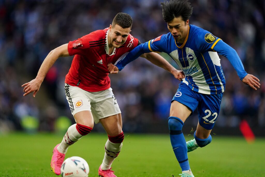 Karou Mitoma in action for Brighton against Manchester United.